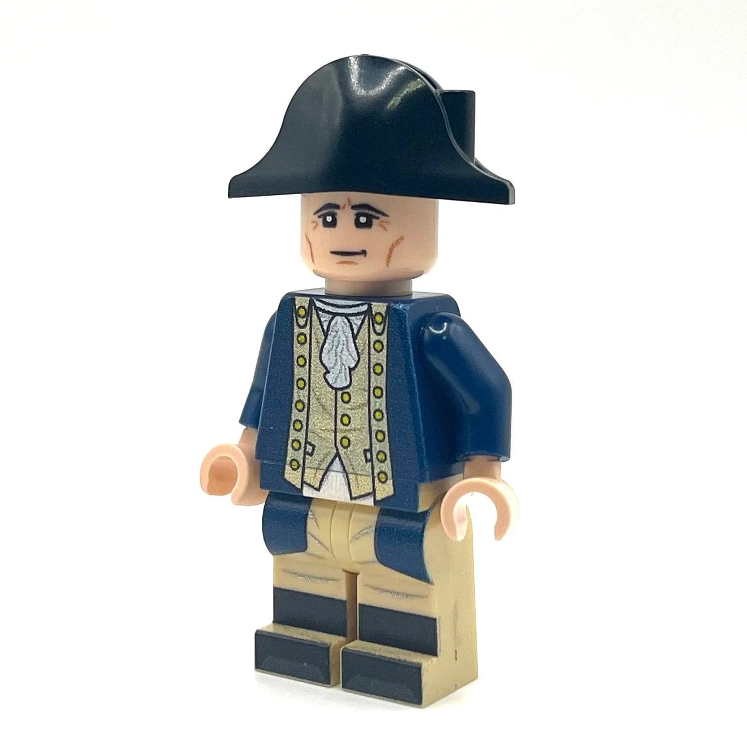 LEGO minifigure of a historical character wearing a blue coat and hat on a white background