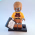 lego figure robot and yellow outfit on a white background