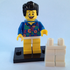 LEGO figure with a colorful shirt and a pair of white pants with him