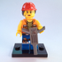 LEGO figure of a construction worker with a hard hat and tool on a light blue background