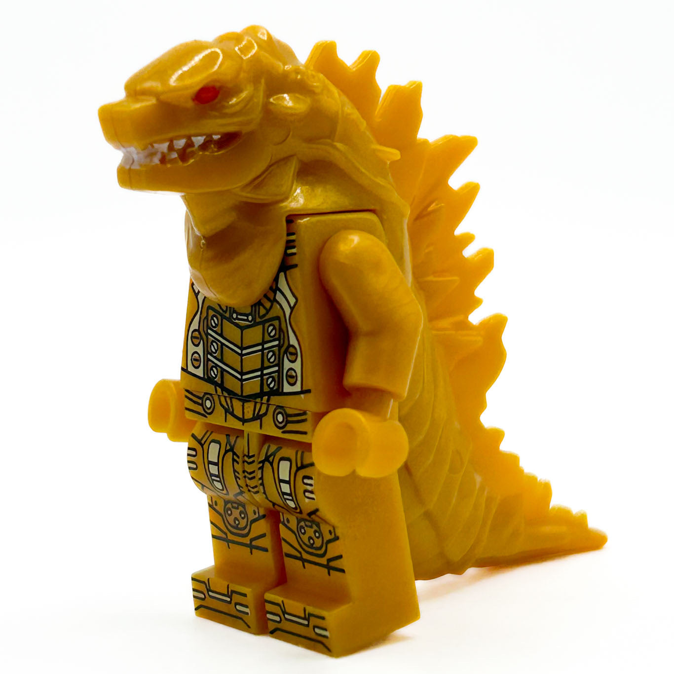 Gold Godzilla-like figure with detailed armor 