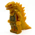 Gold Godzilla-like figure with detailed armor 