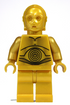 Gold LEGO figure with a black spiral design on a white background
