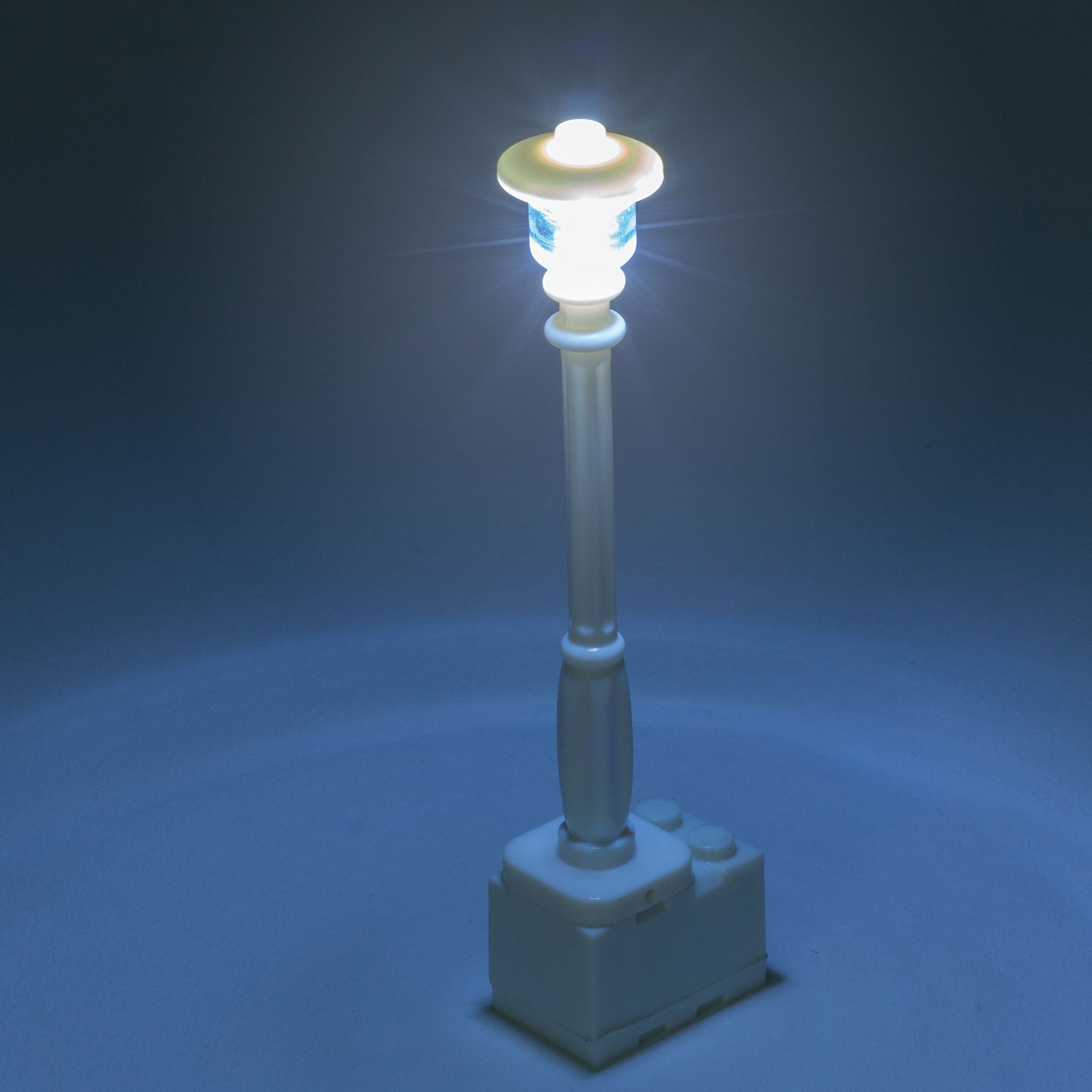 Light-Up Lamp Post (White) on Brick